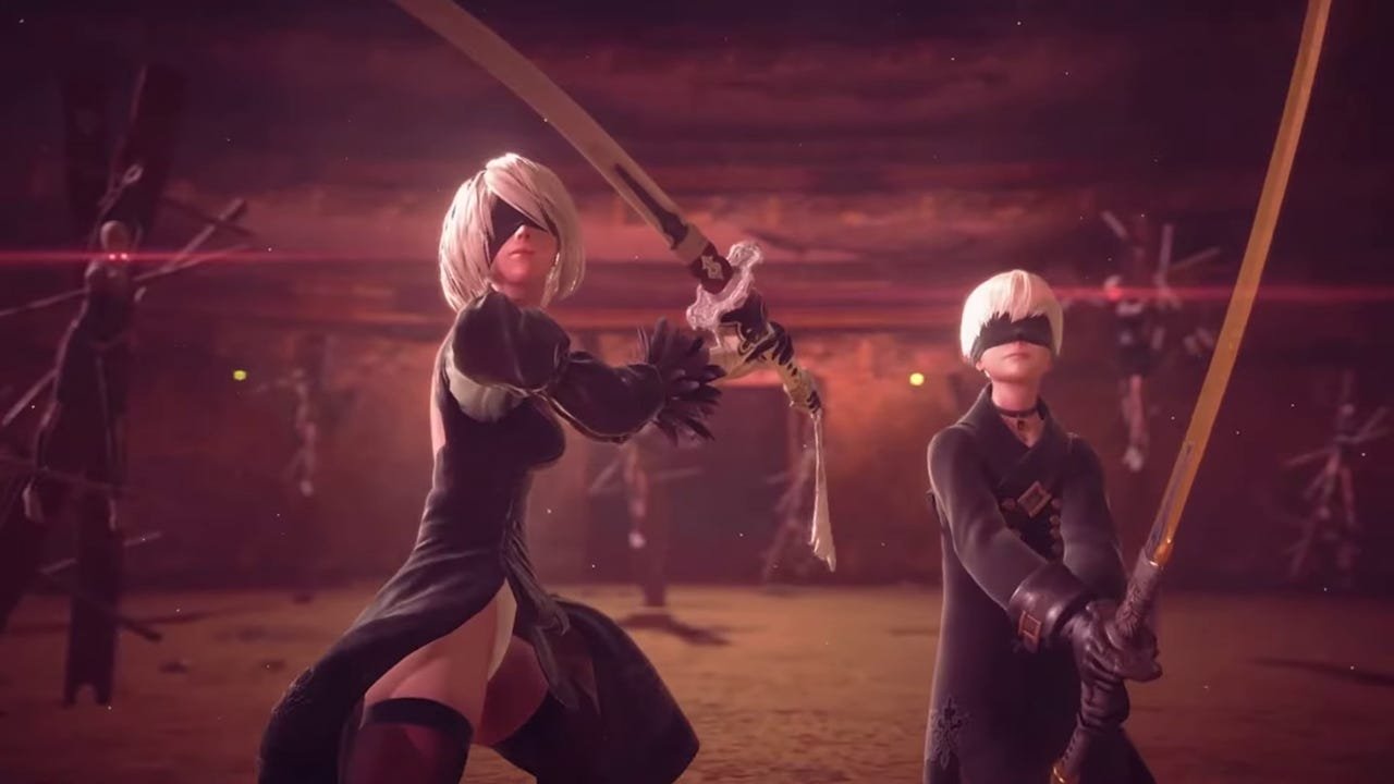 Alt Text: A cinematic view of 2B and 9S standing amidst the ruins of a collapsed city in Nier Automata, symbolizing the game's enduring legacy and recent sales milestone.