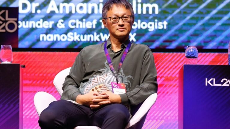 Close-up of high-performance NAND flash memory chips on a circuit board glowing with blue data light patterns.