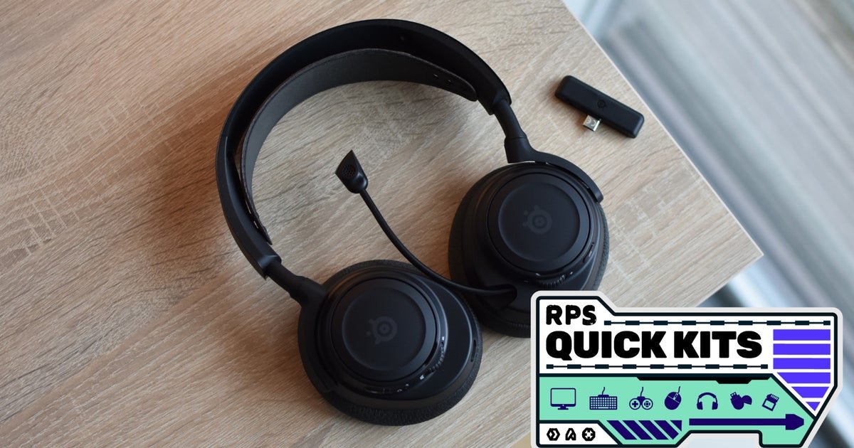A close-up of the SteelSeries Arctis Nova 7X Gen 2 gaming headset resting on a wooden desk next to a glowing Xbox controller.