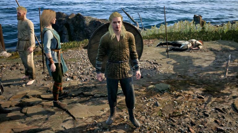 A high-end gaming PC setup with glowing RGB lights next to a PS5 console, showing a blurred Grand Theft Auto VI loading screen.